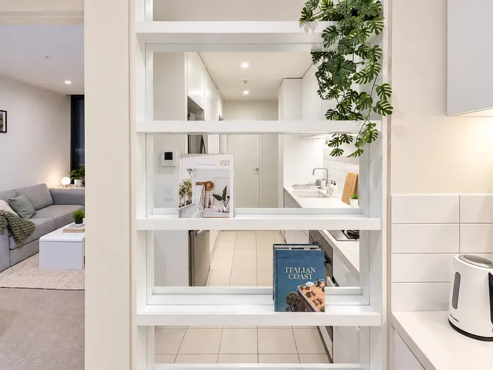 Display shelving between kitchen and living room