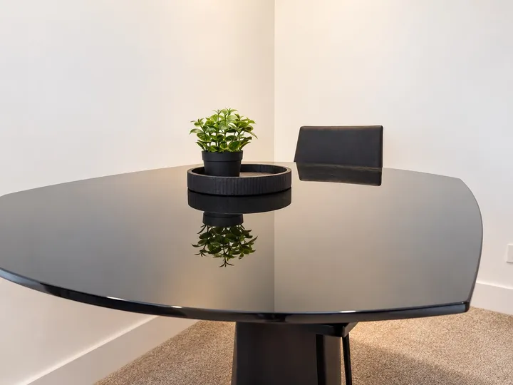 Dining table with decorative plant