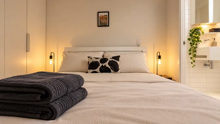 Fresh towels on the double bed