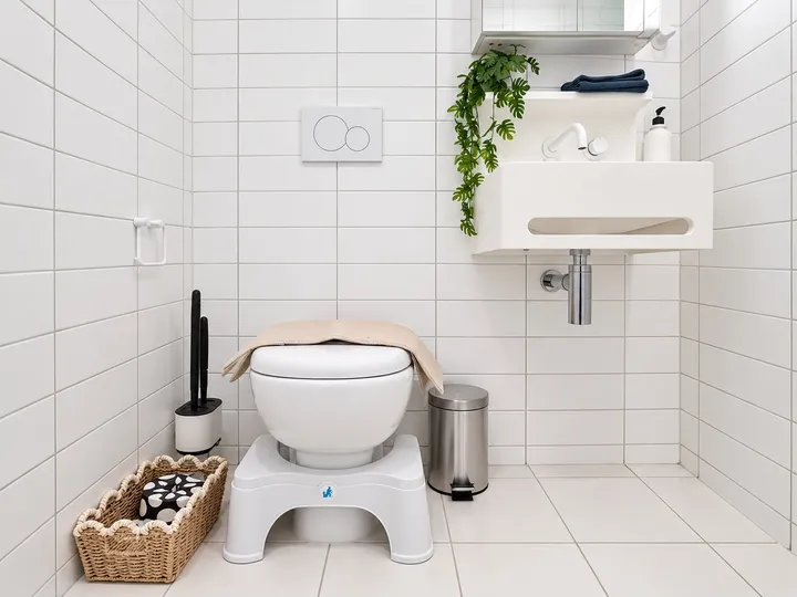 Bathroom with step stool and vanity